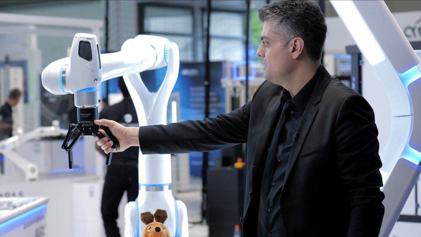 Milad Malekzadeh and robot